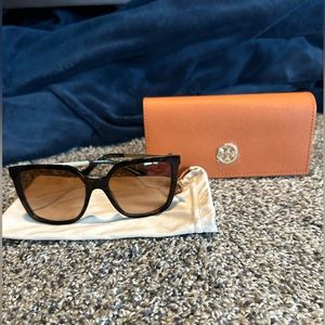 Tory Burch dark brown polarized sunglasses.